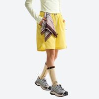 
                  
                    Water-repellent nylon shorts for outdoor - yellow quick-dry shorts with scarf at waist, for warm-weather trekking
                  
                