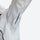 Lightweight waterproof hooded jacket for women - close-up details of zippers cuffs and seams, on-model front view