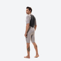 
                  
                    Men's 2mm neoprene spring suit - gray men's wetsuit views, on-model back view, for water sports in warm conditions
                  
                