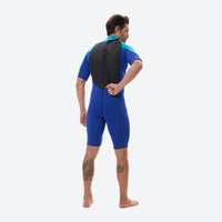 
                  
                    Loom men's 2mm shorty one-piece wetsuit - blue men's wetsuit views, on-model side view, for paddleboarding and kayaking
                  
                