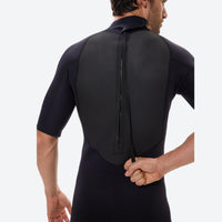 
                  
                    Men's short-sleeve full-leg wetsuit - black men's wetsuit views, on-model back hood view, for snorkeling and swimming
                  
                