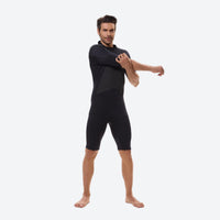 
                  
                    Loom men's 2mm shorty one-piece wetsuit - black men's wetsuit views, on-model side view, for paddleboarding and kayaking
                  
                
