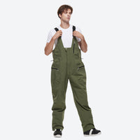 
                  
                    Unisex snowboard jacket and bibs set - olive green bib pants, on-model front view, for skiing and snowboarding
                  
                