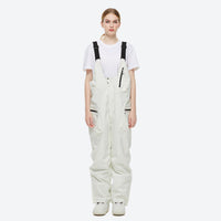 
                  
                    Unisex waterproof 2L snow jacket and bib pants - black bib pants, on-model front view, for resort and backcountry days
                  
                