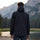 Men's waterproof Toray fabric outdoor jacket - black jacket views, on-model back view, for hiking and outdoor adventures
