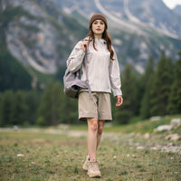 
                  
                    Women's hooded hardshell with slim waist fit - light gray off-white jacket front and lifestyle views
                  
                