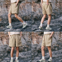 
                  
                    Breathable lightweight trail shorts - khaki tan quick-dry shorts with cream tee, for warm-weather trekking
                  
                