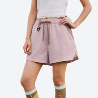 
                  
                    PFC-free eco trail shorts with quick-dry shell - pink water-repellent shorts with white top, for hiking and trail walking
                  
                