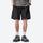 Unisex nylon quick-dry shorts - black quick-dry shorts with gray tee, front standing view, for travel and city walks