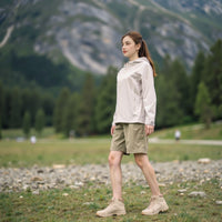 
                  
                    Women's hooded hardshell with slim waist fit - light blue jacket front and lifestyle views, for everyday outdoor wear
                  
                