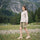 Women's hooded hardshell with slim waist fit - light blue jacket front and lifestyle views, for everyday outdoor wear