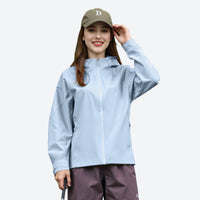 
                  
                    Curve women's 3L hardshell waist-cinching jacket - light blue jacket front and lifestyle views, on-model back view
                  
                