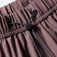 
                  
                    Breathable lightweight trail shorts - coffee brown, waist drawcord close-up, for travel and city walks
                  
                