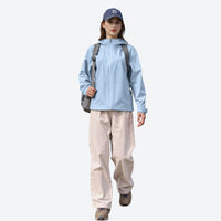 
                  
                    Women's hooded hardshell with slim waist fit - light blue jacket front and lifestyle views, on-model hood side view
                  
                