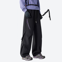 
                  
                    Breathable 650+ fill power duck down snow pants - black down pants with lavender top, for resort and backcountry days
                  
                