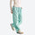 Water-repellent nylon hiking pants with relaxed fit - mint green wide-leg hiking pants with cream top, walking side view