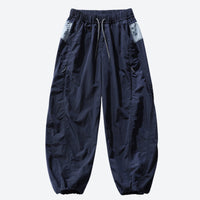 
                  
                    Unisex lightweight quick-dry hiking pants - olive, high-density mesh fabric close-up with text, for warm-weather adventures
                  
                