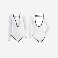 
                  
                    White neoprene diving suit with black trim - V-neck open-back white wetsuit front and detail views, for cold water activities
                  
                