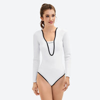 
                  
                    Women's front-zip wetsuit for surfing - V-neck open-back white wetsuit front and detail views, for surfing and water sports
                  
                
