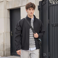 
                  
                    Pavo men's 3L golf hardshell jacket - black men's golf jacket views, on-model side view, for travel and active lifestyles
                  
                