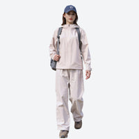 
                  
                    Curve women's 3L hardshell waist-cinching jacket - light pink beige jacket front and lifestyle views, on-model side view
                  
                