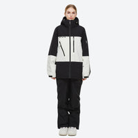 
                  
                    Unisex waterproof 2L snow jacket and bib pants - coffee brown bib pants, on-model side view, for cold-weather winter sports
                  
                
