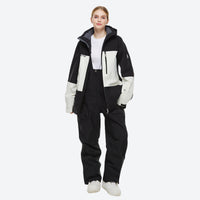 
                  
                    Unisex snowboard jacket and bibs set - gray and black colorblock jacket with black pants, adjustable suspenders on bib pants
                  
                