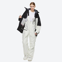 
                  
                    Unisex snowboard jacket and bibs set - black and white colorblock jacket with white pants, adjustable suspenders on bib pants
                  
                