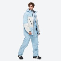 
                  
                    Unisex snowboard jacket and bibs set - ice blue jacket with white pants, for powder and piste riding
                  
                