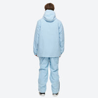 
                  
                    Unisex waterproof 2L snow jacket and bib pants - ice blue jacket with white pants, for cold-weather winter sports
                  
                