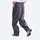 Lightweight water-repellent hiking pants with pockets - dark gray quick-dry hiking pants with blue top, back walking view