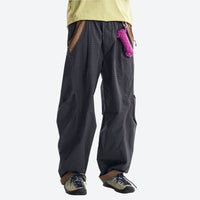 
                  
                    Lightweight water-repellent hiking pants with pockets - dark gray quick-dry hiking pants with yellow top
                  
                