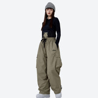 
                  
                    Waterproof 2L ski jacket pants combo - white pants colorway, for winter mountain adventures
                  
                