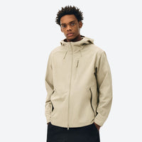 
                  
                    Seamless waterproof softshell jacket - mustard and beige color variants front views, for travel and everyday wear
                  
                