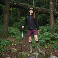 
                  
                    Waterproof fitted hiking jacket for women - black jacket front and lifestyle views, for everyday outdoor wear
                  
                