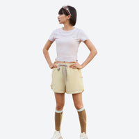 
                  
                    PFC-free eco trail shorts with quick-dry shell - yellow water-repellent shorts with white top, for warm-weather training
                  
                