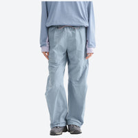 
                  
                    Breathable lightweight wide-leg trail pants - light blue wide-leg hiking pants with blue top, for warm-weather trekking
                  
                