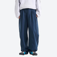 
                  
                    Breathable knit trail pants with cuffed hem - navy knit cargo pants with white top, for travel and city walks
                  
                