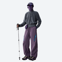 
                  
                    Breathable 650+ fill power duck down snow pants - purple down pants with gray top, for cold-weather winter sports
                  
                
