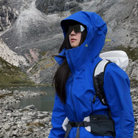 
                  
                    Women's breathable hardshell with hood - blue color variant front views, for travel and everyday wear
                  
                