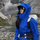 Women's breathable hardshell with hood - blue color variant front views, for travel and everyday wear