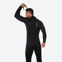 
                  
                    Sand 3mm unisex one-piece wetsuit - men's black wetsuit views, on-model side view, for snorkeling and swimming
                  
                