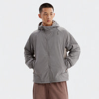 
                  
                    Light blue cloud-fleece hooded outdoor jacket model view
                  
                
