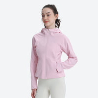 
                  
                    Women's cropped 3-layer rain jacket - light blue jacket views, on-model side view, for mountain and coastal adventures
                  
                