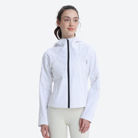 
                  
                    Women's waist-fit waterproof jacket with vents - white jacket views, on-model front view, for everyday urban wear in rain
                  
                