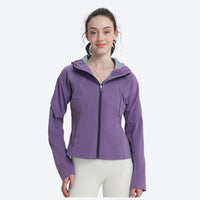 
                  
                    Women's waist-fit waterproof jacket with vents - purple jacket views, on-model back view, for hiking and trail running
                  
                