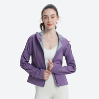 
                  
                    Women's cropped 3-layer rain jacket - pink jacket views, on-model front view, for everyday urban wear in rain
                  
                