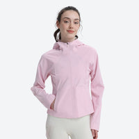 
                  
                    Women's waist-fit waterproof jacket with vents - light blue jacket views, for outdoor activities and travel
                  
                