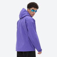 
                  
                    Lightweight waterproof hooded jacket for men - lime green and orange color variant views, on-model front with goggles on head
                  
                