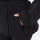 Women's waterproof 3L ski jacket and pants set - black, side pocket close-up with hand, for resort and cross-country days